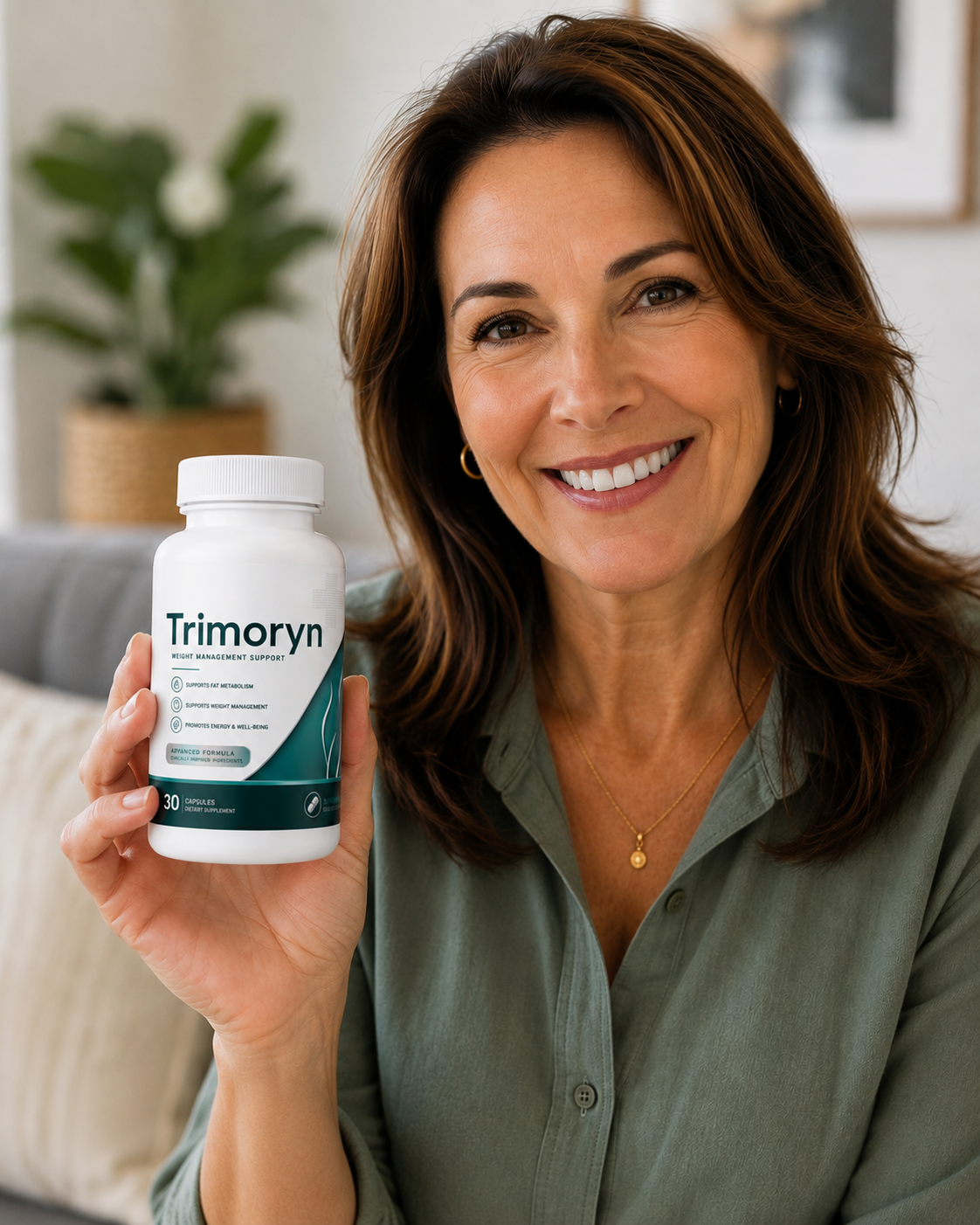 Woman holding Trimoryn — Natural Supplement
